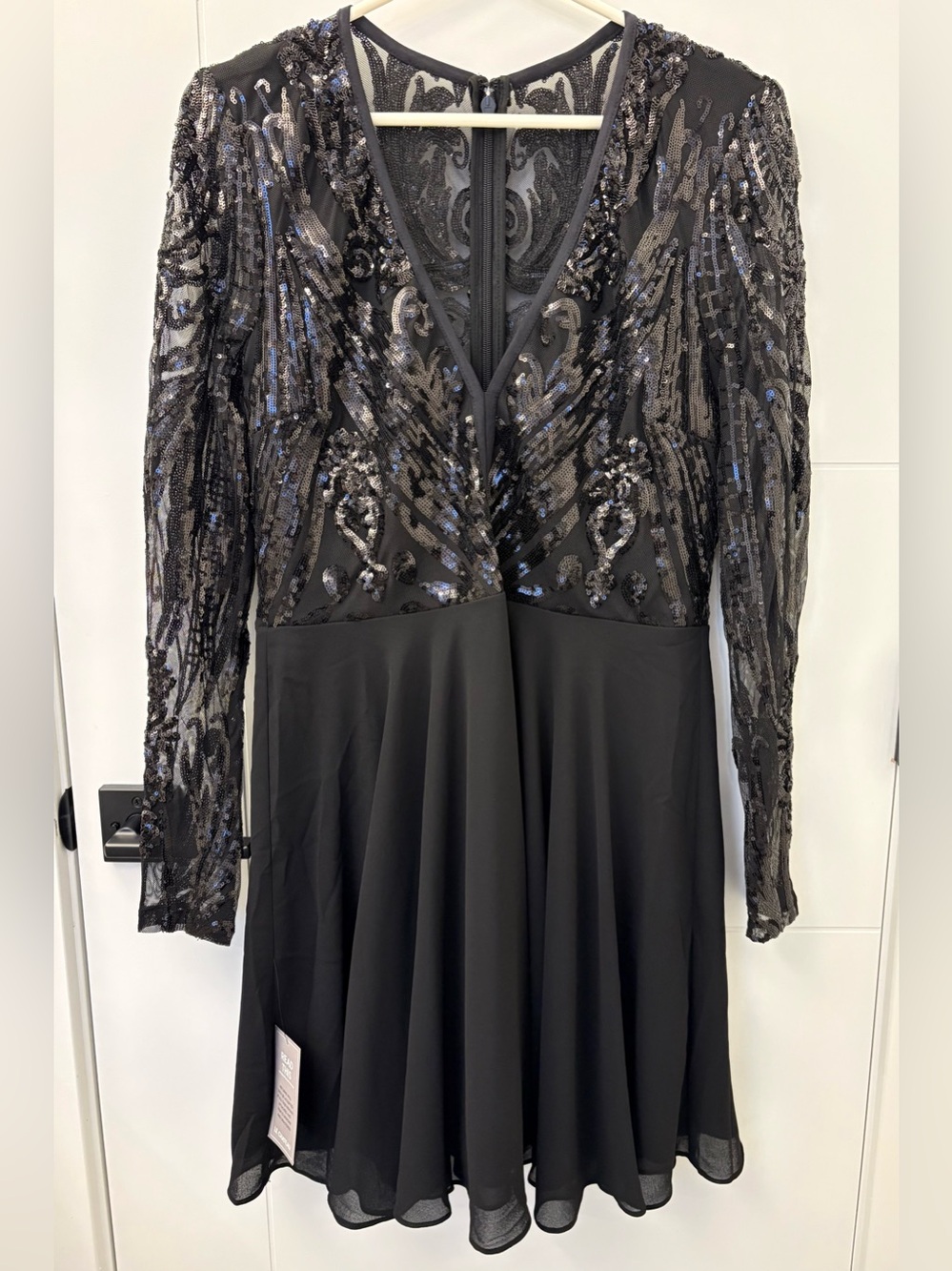Le Chateau Sequin Mini Dress in Black
Size Large NWT